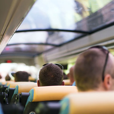 a group of people on a hire bus