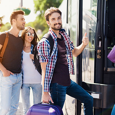 passenger getting on a hire bus 